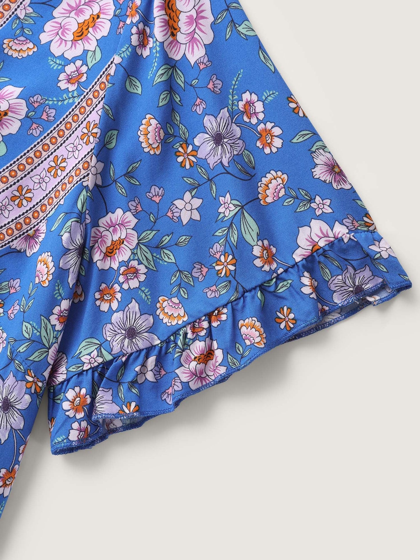 Asymmetrical Floral Print V-Neck Blouse