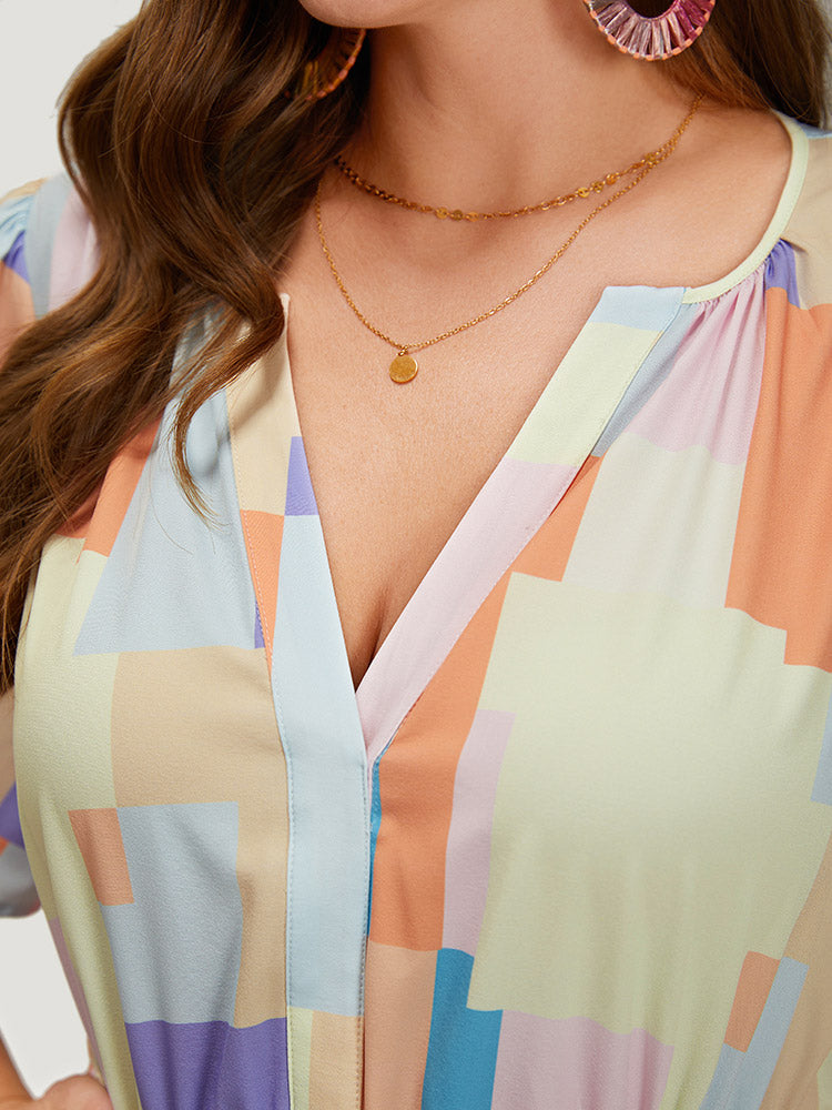 Geometric Notched Pocket Shirred Flutter Hem Dress