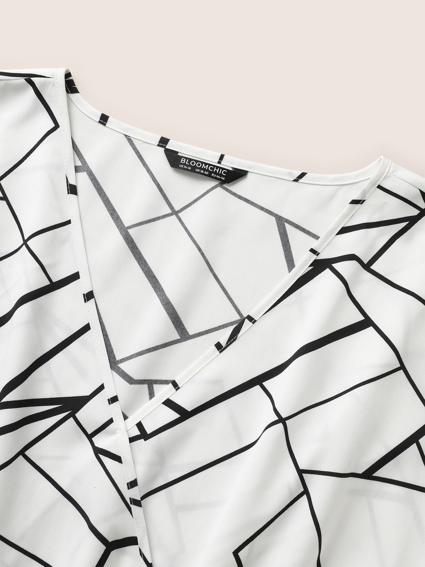 Geometric Overlap Collar Ruffle Sleeve Blouse