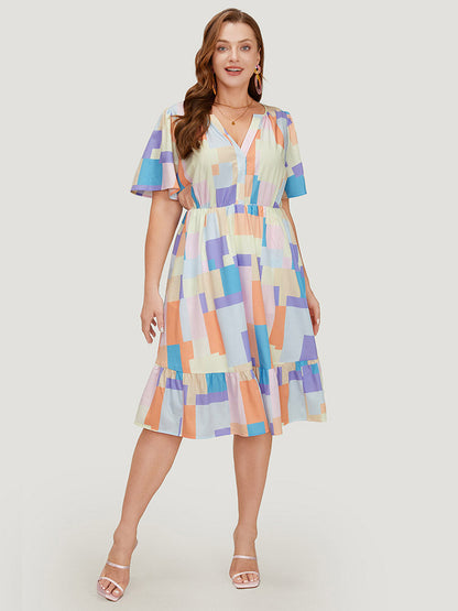 Geometric Notched Pocket Shirred Flutter Hem Dress