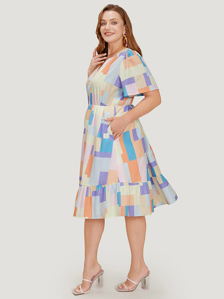 Geometric Notched Pocket Shirred Flutter Hem Dress