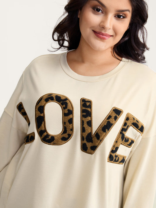 Wild Love Print Slit Hem Sweatshirt