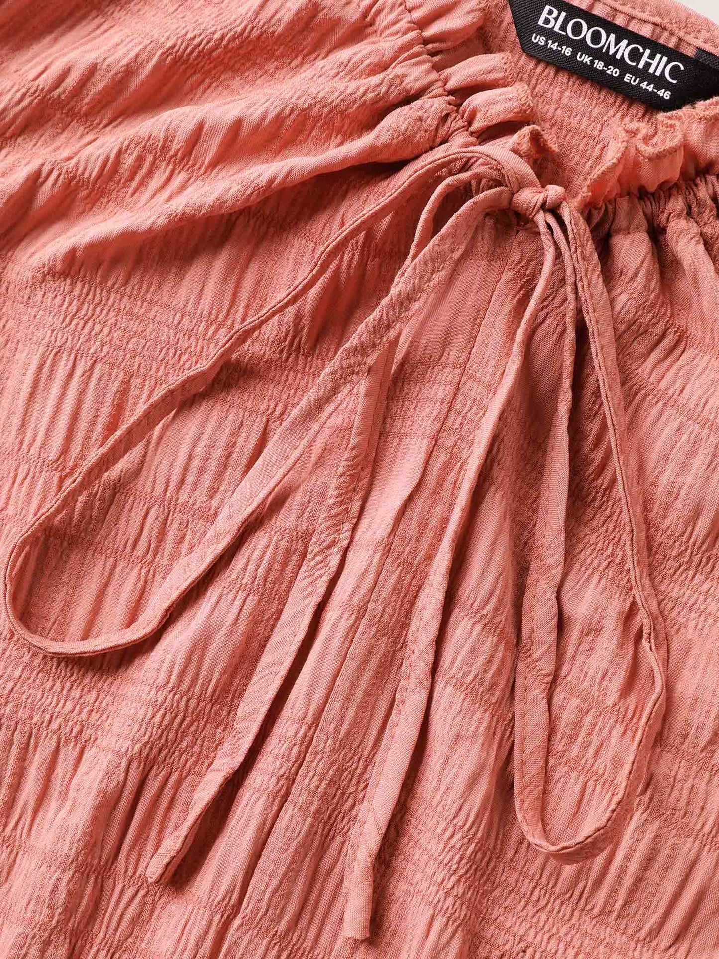 Textured Neck-Tie Layered Pockets Midi Dress